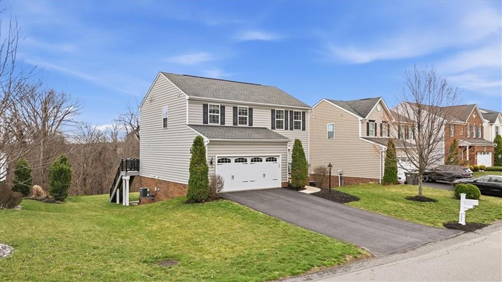235 Long Ridge Drive Coraopolis, PA 15108 - Photo 2 of 36 a view of a house with a yard