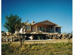 2170 Big Chino Road Paulden, AZ 86334 - Photo 1 of 1 a front view of a house with a yard
