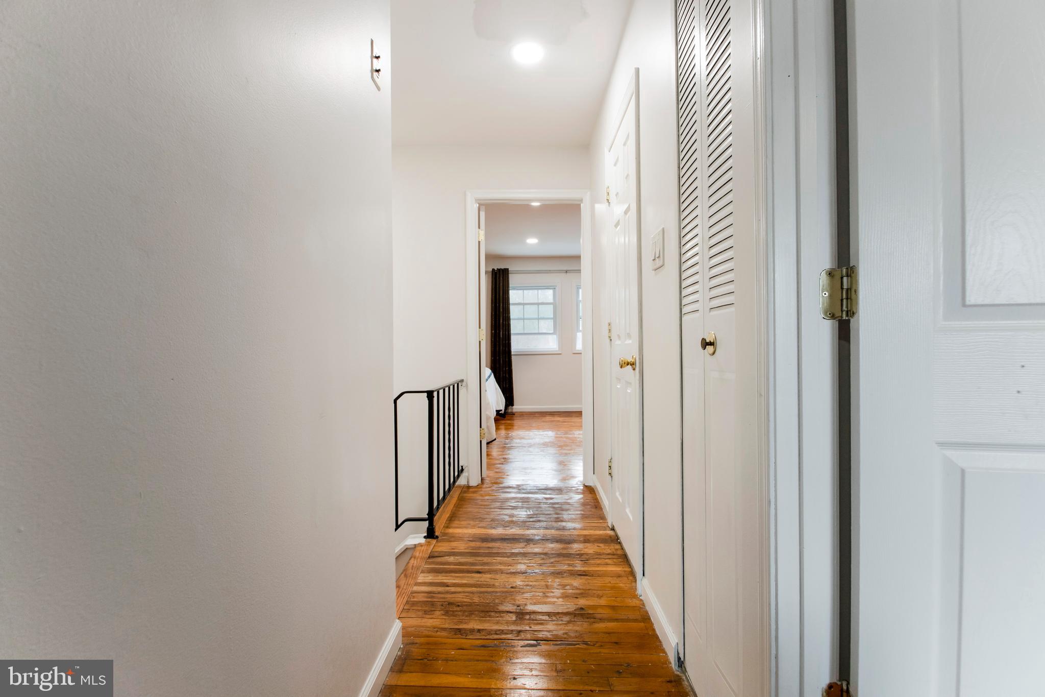 8253 Vosges Road Baltimore, MD 21208 - Photo 25 of 67 Upper Level Hall Way Hrd/Wood Floors