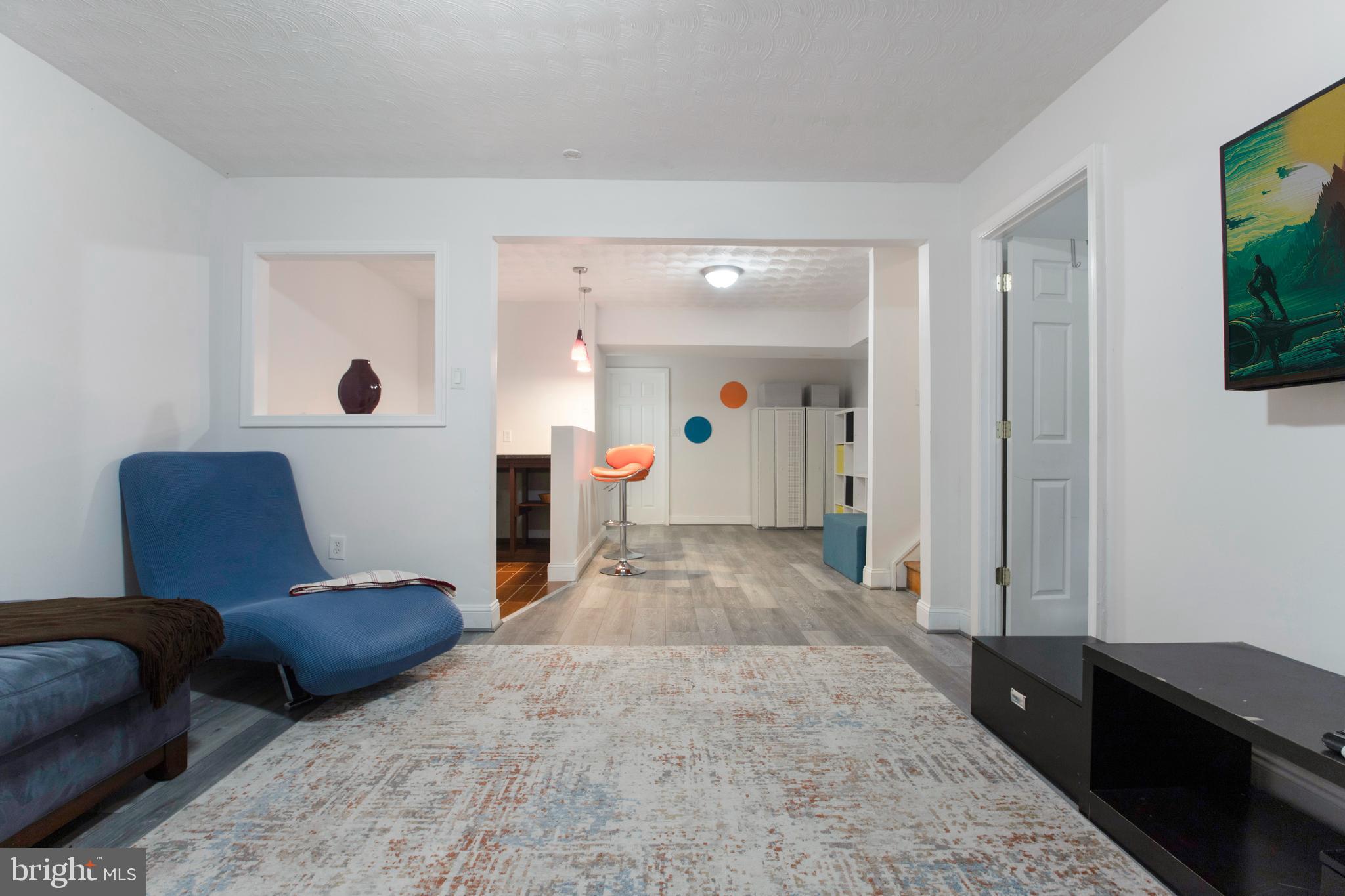 8253 Vosges Road Baltimore, MD 21208 - Photo 54 of 67 Lower Level Seating Area. Suitable for Adult Child