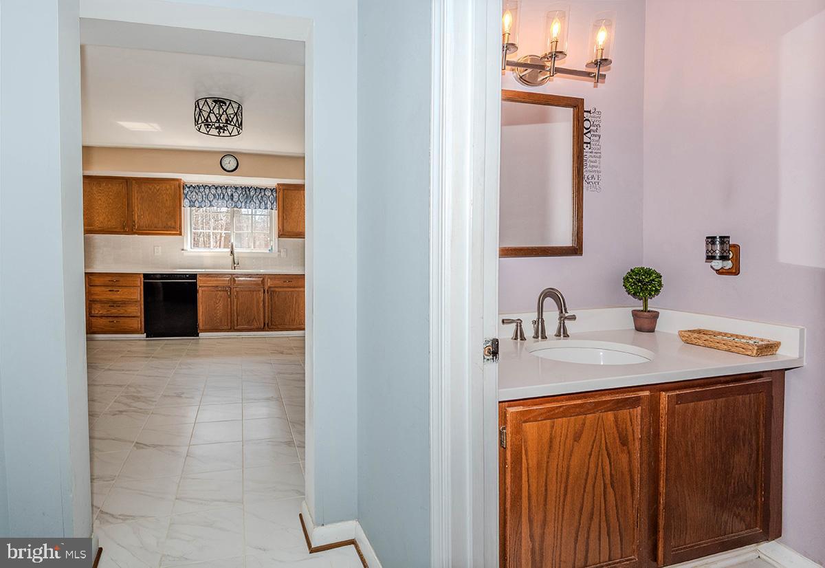 213 King James Road Upper Marlboro, MD 20774 - Photo 12 of 41 The first floor half bath is perfect for guests.