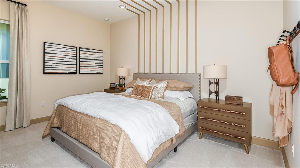 15680 Cassio Way Naples, FL 34114 - Photo 11 of 36 a bedroom with a bed and window