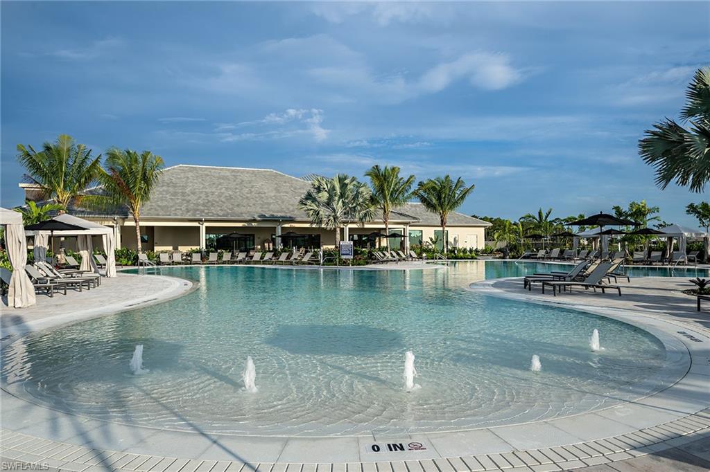 15680 Cassio Way Naples, FL 34114 - Photo 29 of 36 a view of a swimming pool and outdoor space