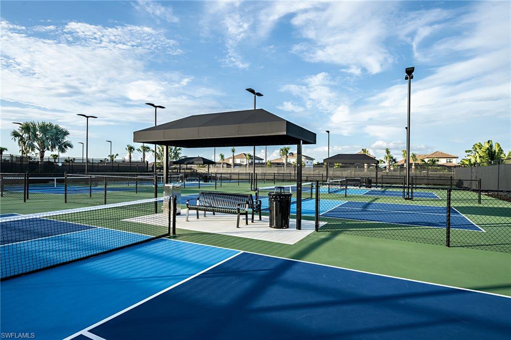 15680 Cassio Way Naples, FL 34114 - Photo 33 of 36 a view of outdoor space with seating