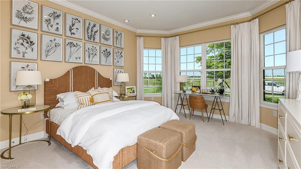 15680 Cassio Way Naples, FL 34114 - Photo 9 of 36 a bedroom with a bed and a large window with the outer view