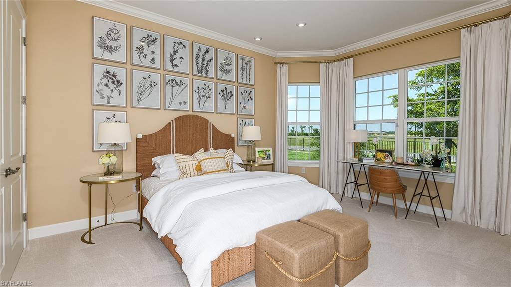 15680 Cassio Way Naples, FL 34114 - Photo 10 of 36 a bedroom with a bed and a large window