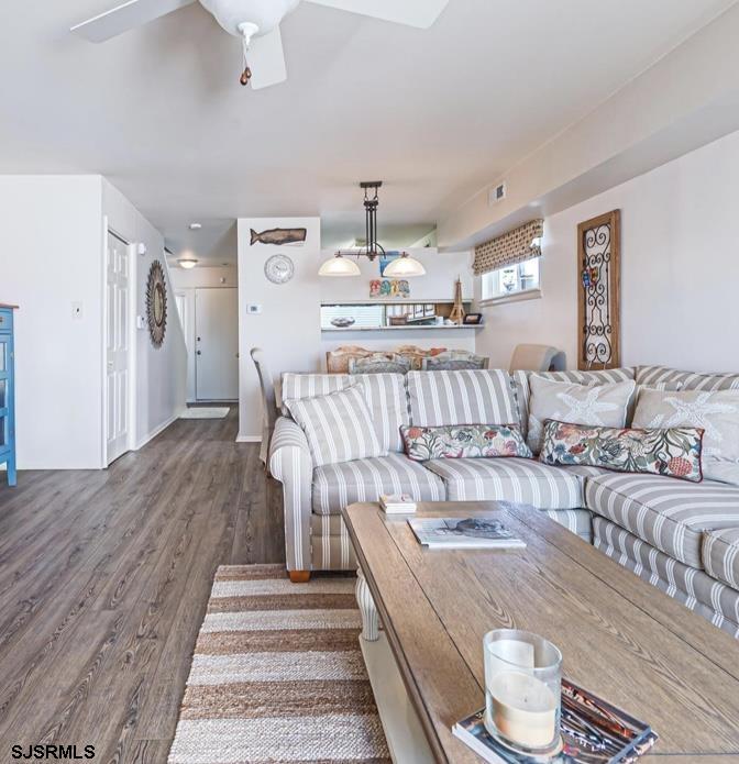 124 44th Street South, Unit B Brigantine, NJ 08203 - Photo 5 of 13 a living room with furniture and wooden floor