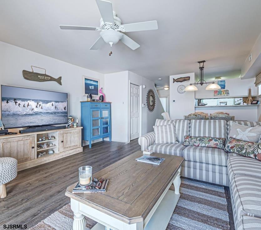 124 44th Street South, Unit B Brigantine, NJ 08203 - Photo 7 of 13 a living room with furniture and a wooden floor