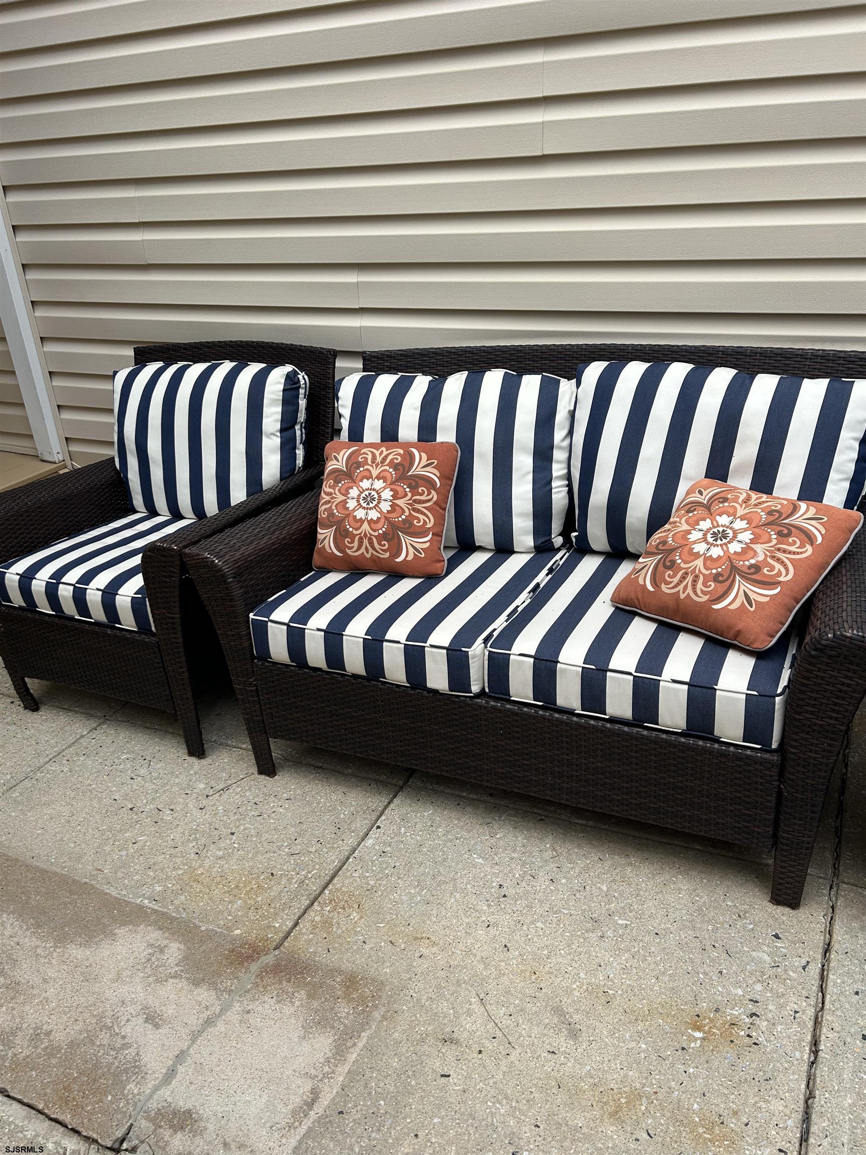 124 44th Street South, Unit B Brigantine, NJ 08203 - Photo 8 of 13 a view of a bench in a patio
