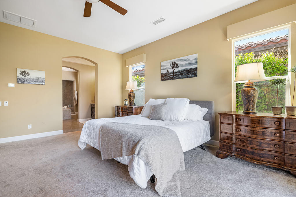 56825 Mountain View La Quinta, CA 92253 - Photo 20 of 30 a bedroom with a bed and a window