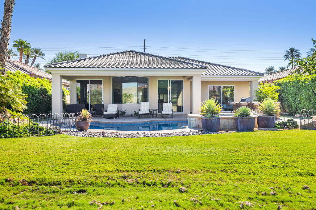 56825 Mountain View La Quinta, CA 92253 - Photo 29 of 30 a view of a house with swimming pool having outdoor seating