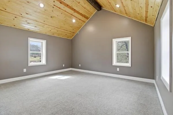 an empty room with windows