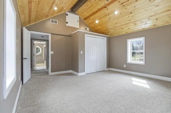 an empty room with windows