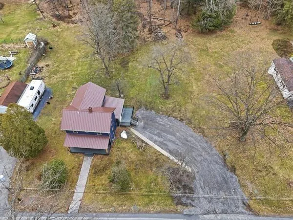 a view of a yard with a slide