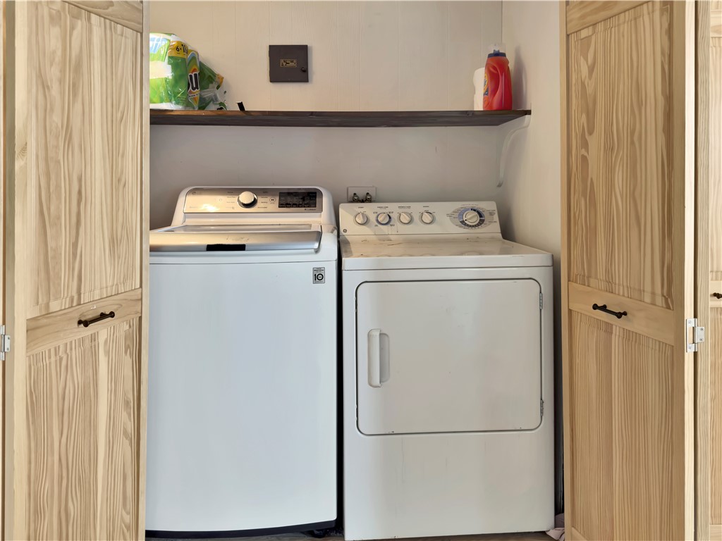 33 Indian Pond Road Kingston, MA 02364 - Photo 40 of 44 Laundry behind double doors in Family Room