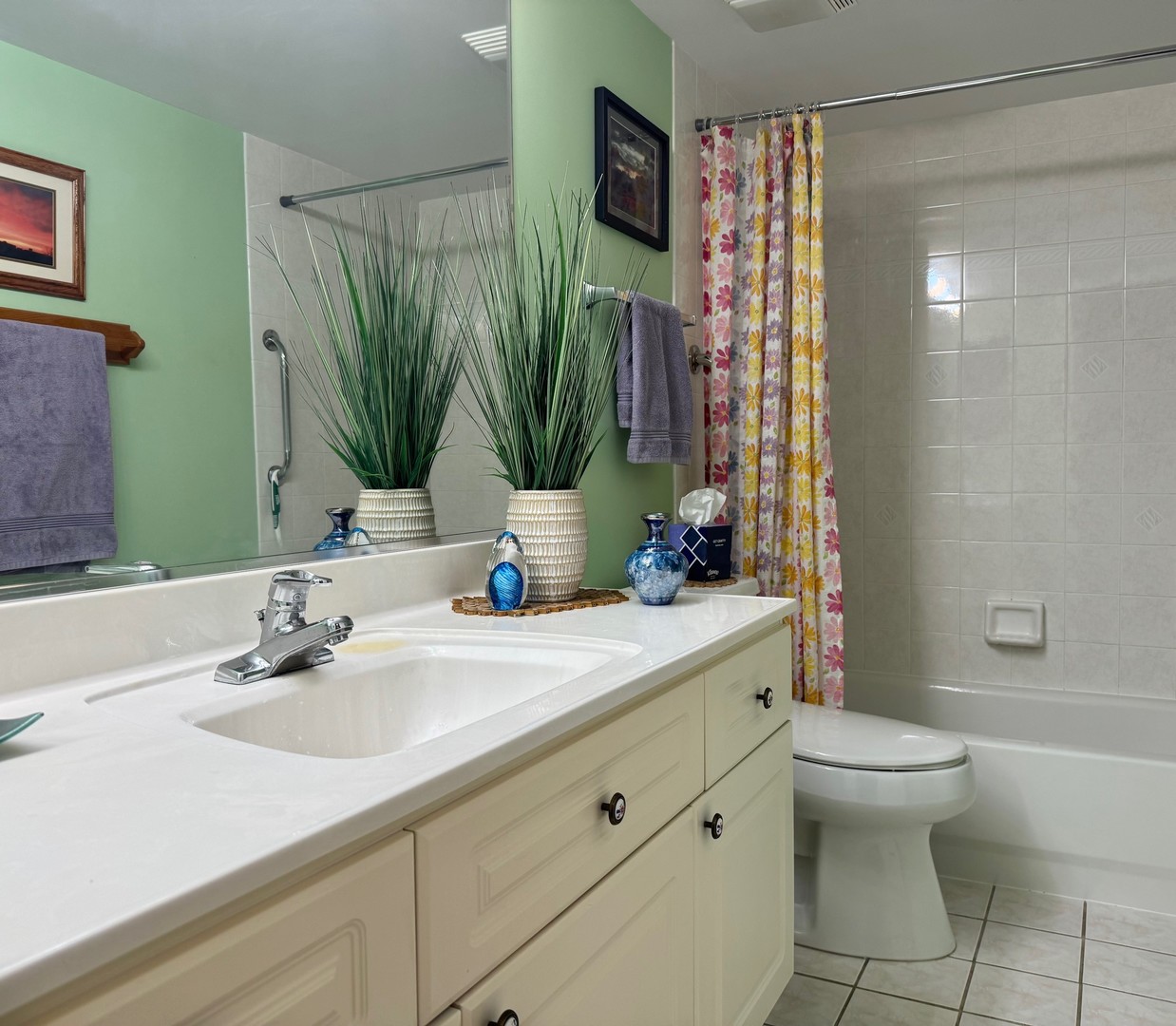 1325 Perry Street, Unit 606 Des Plaines, IL 60016 - Photo 15 of 25 a bathroom with a granite countertop sink a toilet and a mirror