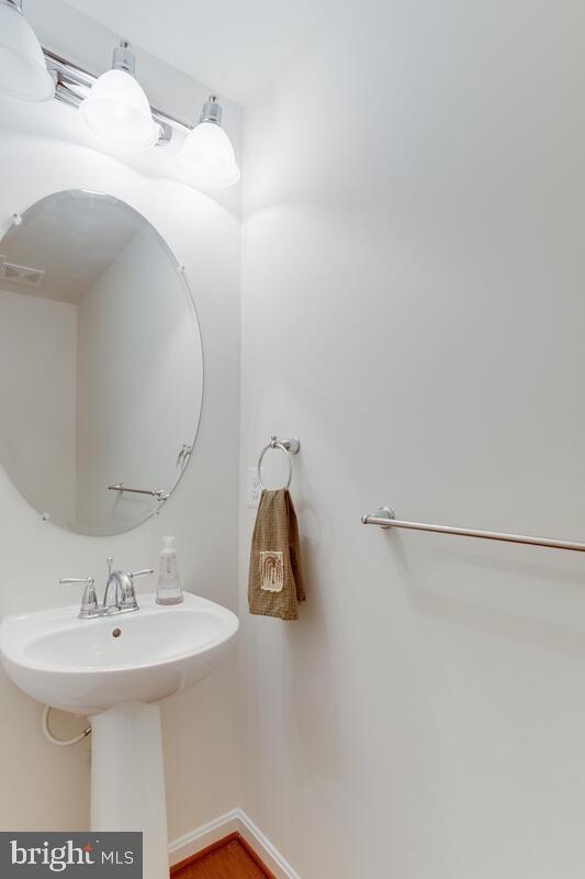 7931 Silver Oak Road Hanover, MD 21076 - Photo 43 of 46 powder room main level