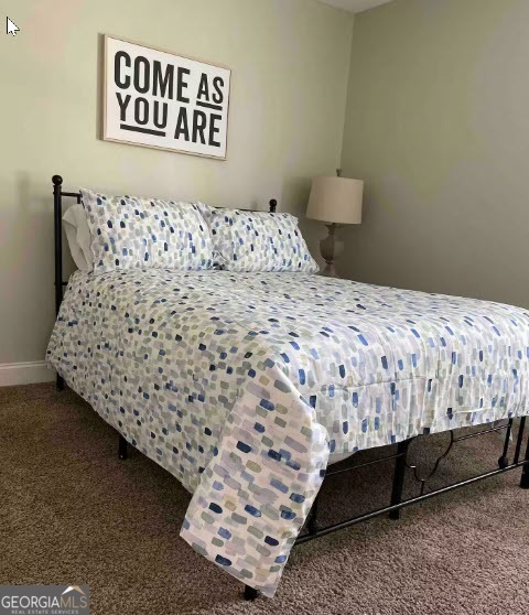 308 Haven Way Perry, GA 31069 - Photo 17 of 17 a bedroom with a bed and a couch