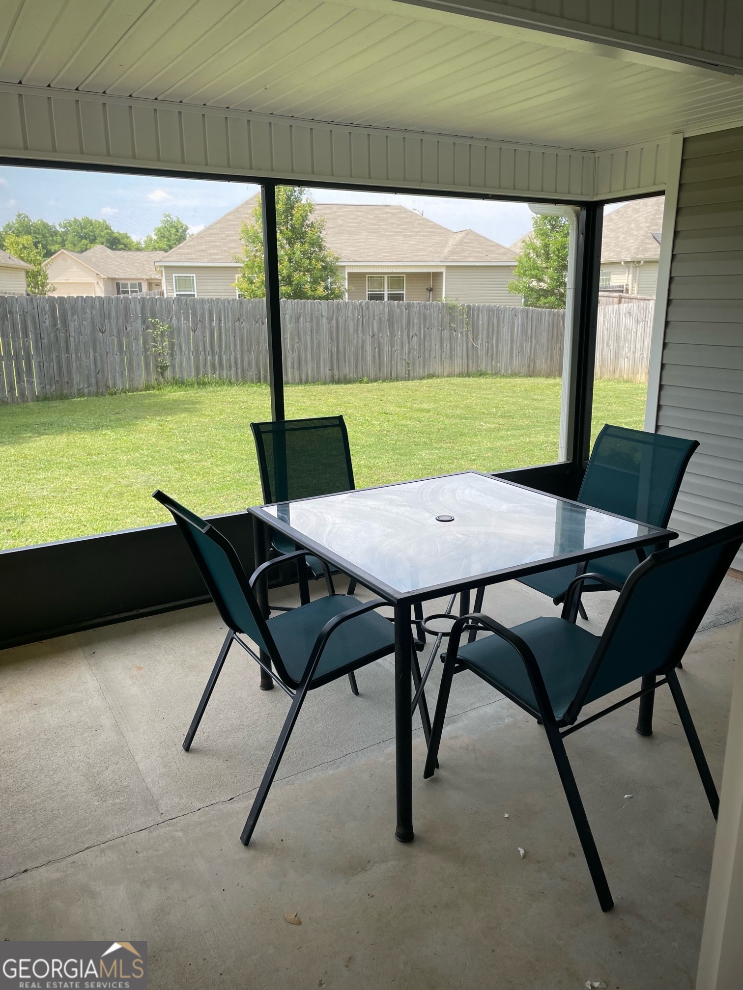 308 Haven Way Perry, GA 31069 - Photo 7 of 17 a view of a chairs and table in the patio