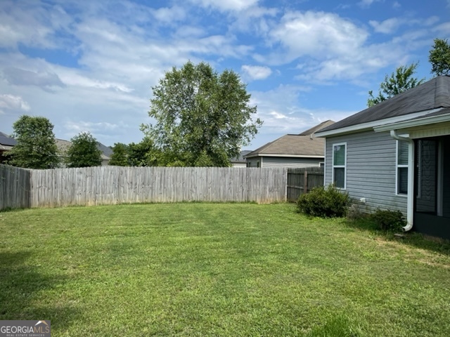308 Haven Way Perry, GA 31069 - Photo 9 of 17 a view of a back yard of the house
