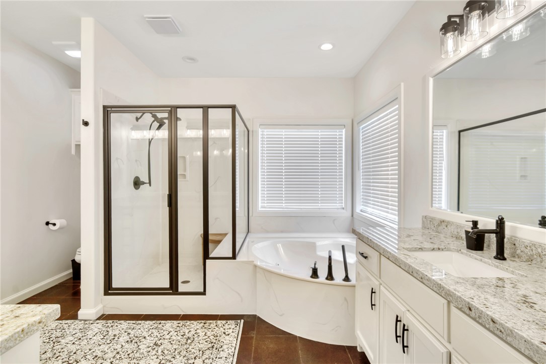 9652 Locke Road Bryan, TX 77808 - Photo 12 of 50 UPDATED PRIMARY BATH, SEPARATE SHOWER AND BATH