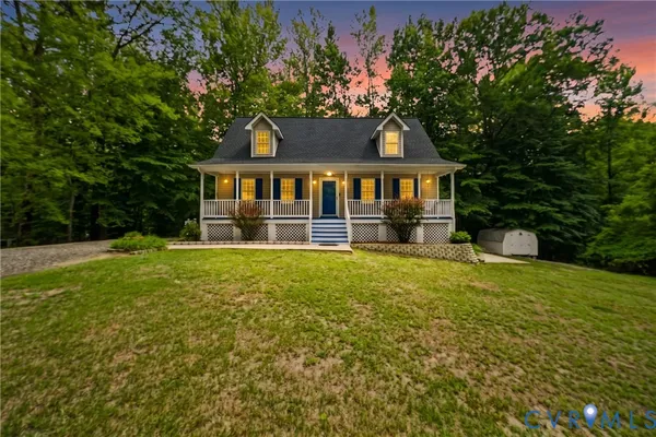 front view of a house with a yard