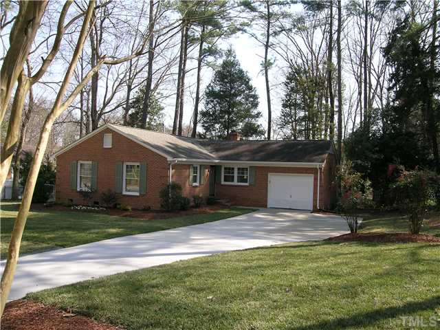 604 Purdue Street Raleigh, NC 27609 - Photo 1 of 12 a house that has a tree in front of a house