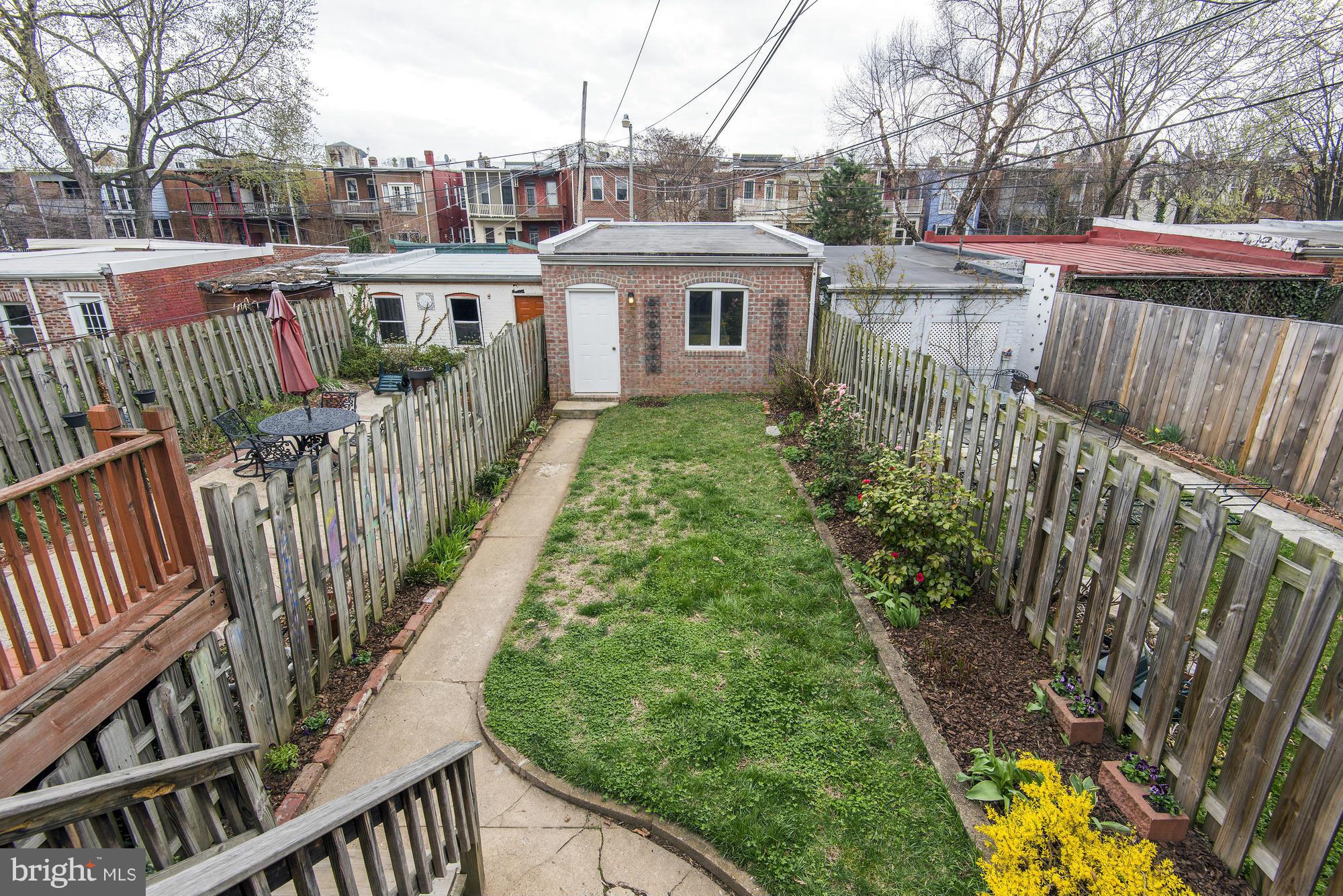 1351 A Street Northeast Washington, DC 20002 - Photo 13 of 26 a view of a house with wooden deck