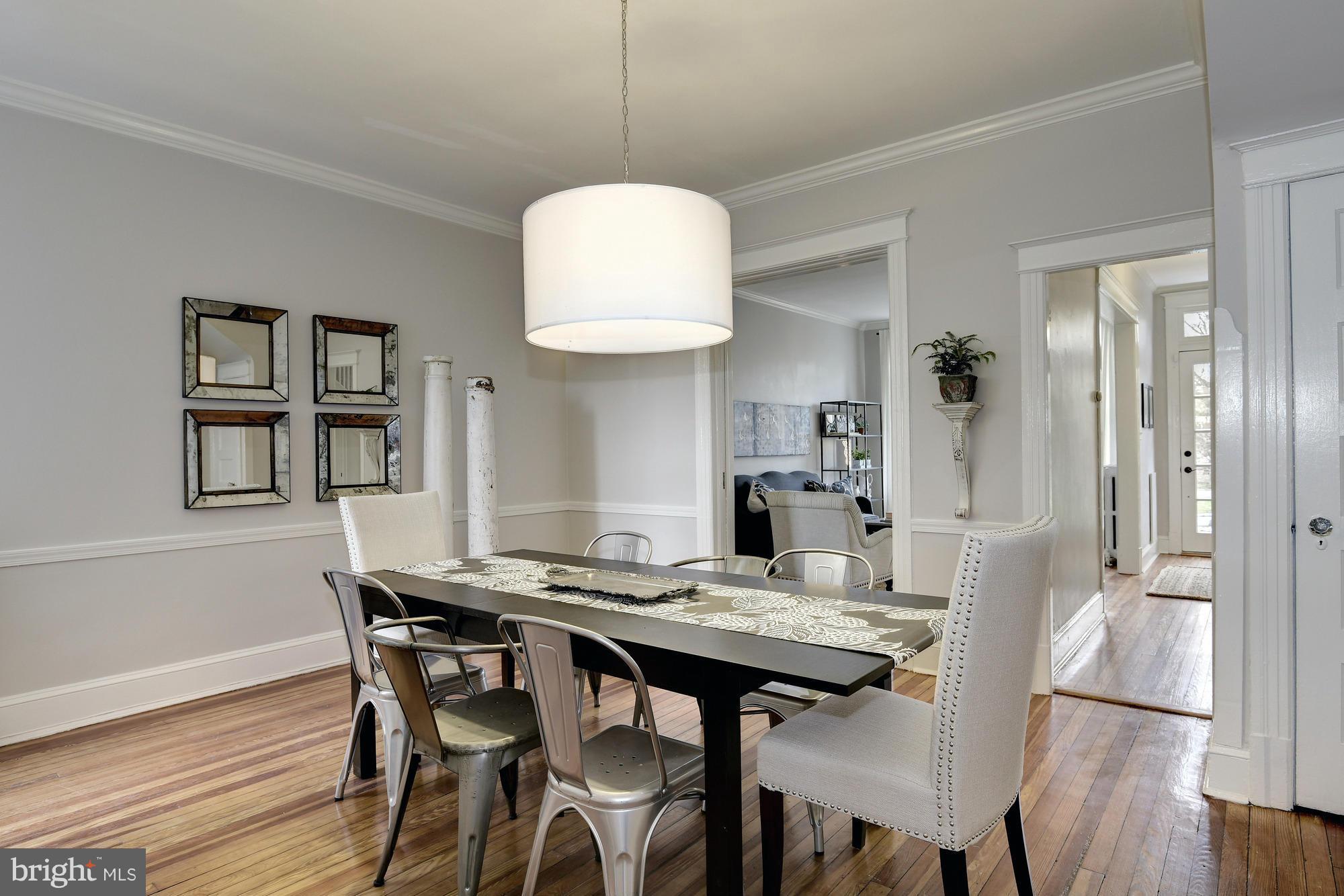 1351 A Street Northeast Washington, DC 20002 - Photo 7 of 26 a view of a dining room with furniture and wooden floor