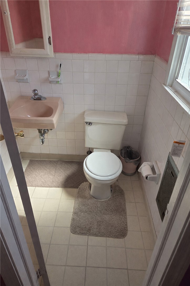 206 Collingwood Drive Anderson, SC 29621 - Photo 11 of 23 This bathroom features tile flooring, offering a clean and practical space for daily routines.