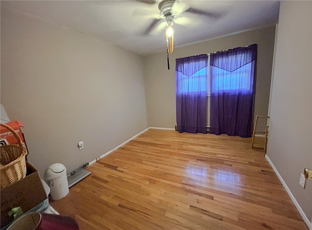 206 Collingwood Drive Anderson, SC 29621 - Photo 18 of 23 This airy room features rich hardwood flooring and a functional ceiling fan.