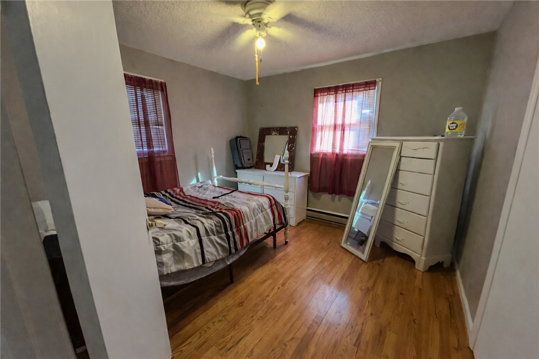 206 Collingwood Drive Anderson, SC 29621 - Photo 9 of 23 This spacious bedroom features lustrous hardwood flooring and ample natural light through multiple windows.