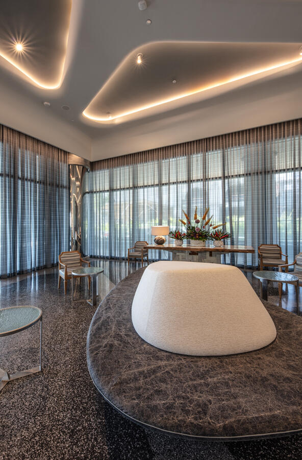 1333 South Flagler Drive, Unit 1001 West Palm Beach, FL 33401 - Photo 11 of 20 a living room with furniture and a floor to ceiling window