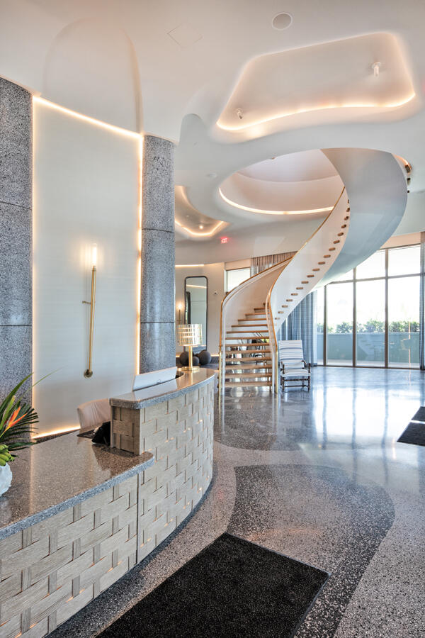 1333 South Flagler Drive, Unit 1001 West Palm Beach, FL 33401 - Photo 13 of 20 a bathroom with a granite countertop sink and a mirror