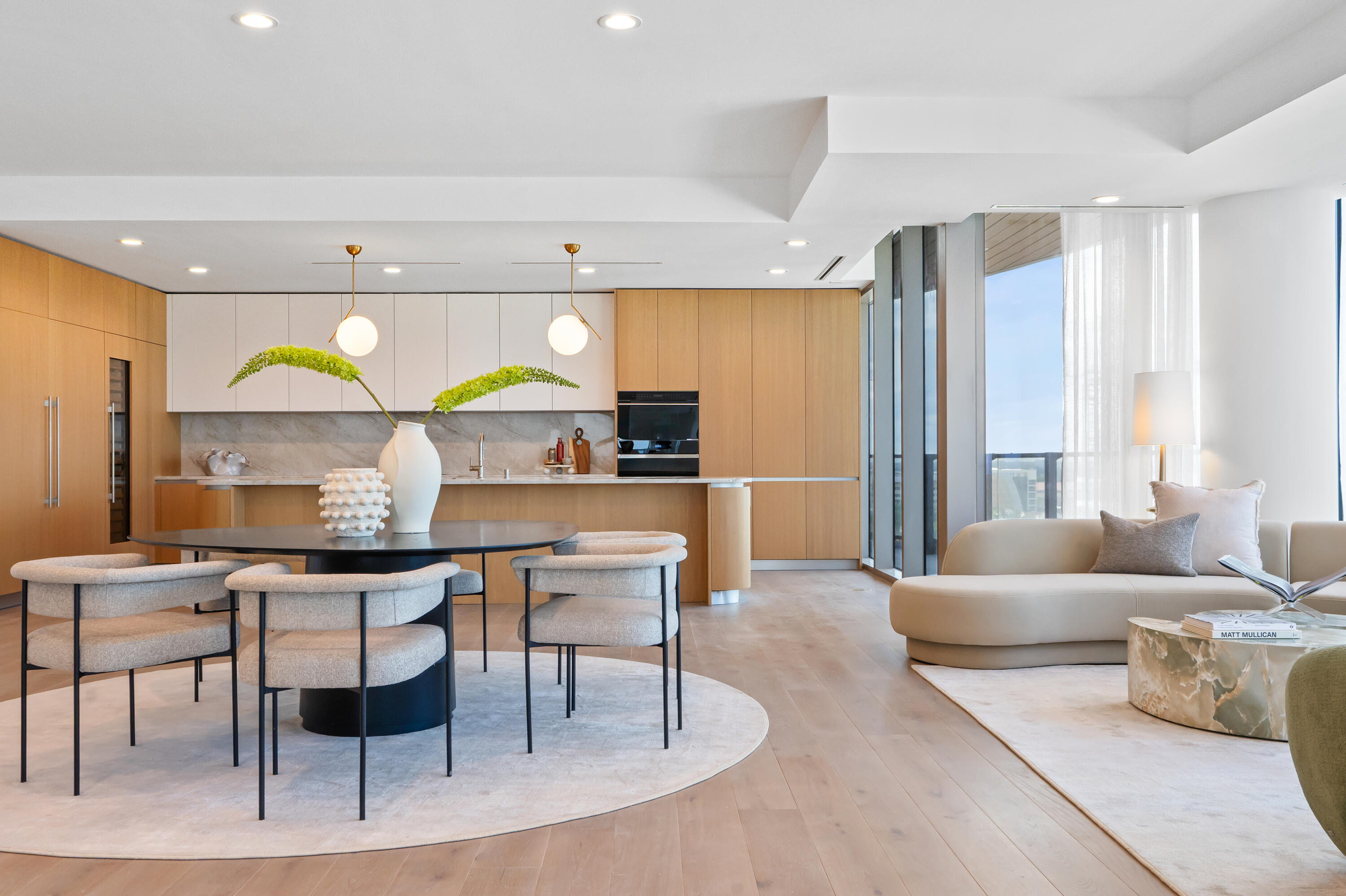1333 South Flagler Drive, Unit 1001 West Palm Beach, FL 33401 - Photo 4 of 20 a living room with furniture a rug and a large window