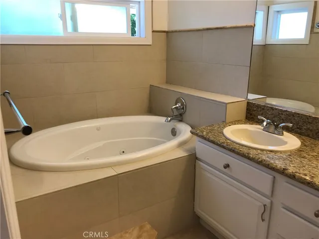 a bathroom with a sink and a bathtub