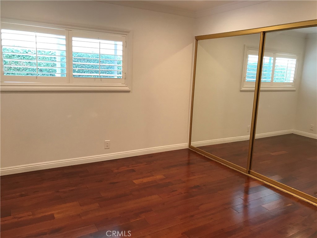 3 Morris Road Irvine, CA 92620 - Photo 15 of 24 an empty room with wooden floor and windows