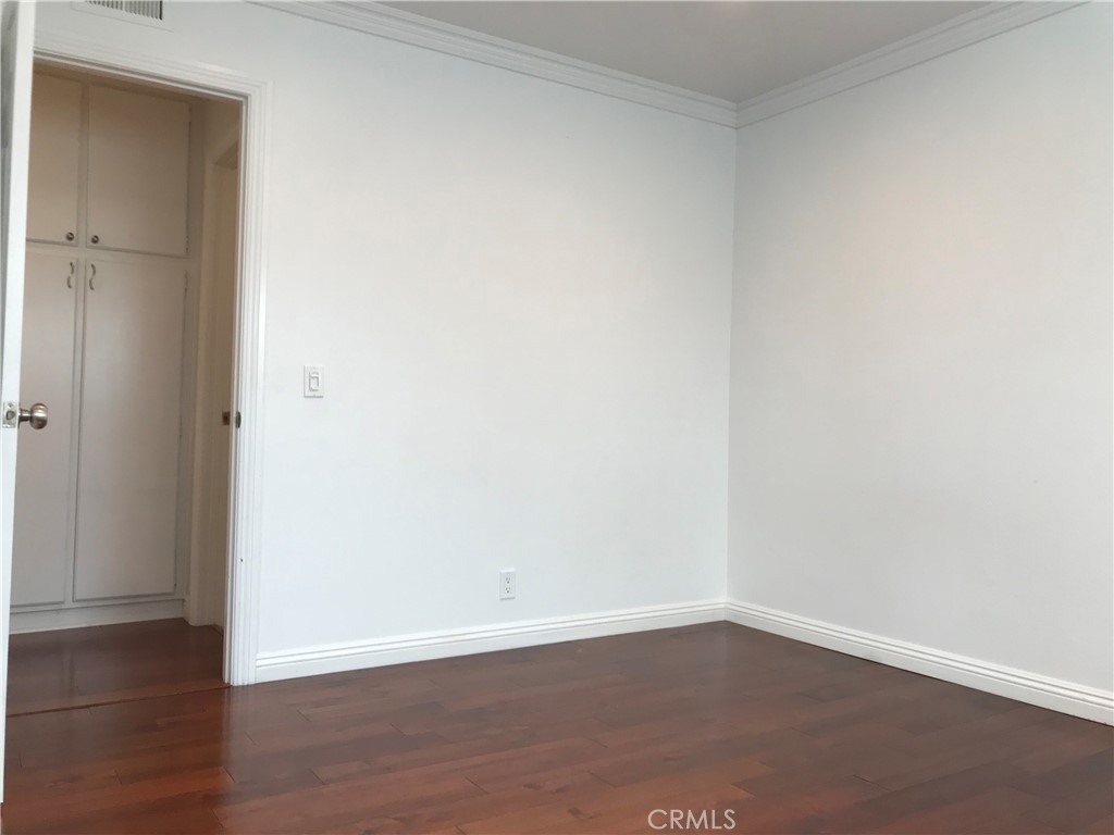 3 Morris Road Irvine, CA 92620 - Photo 16 of 24 an empty room with wooden floor