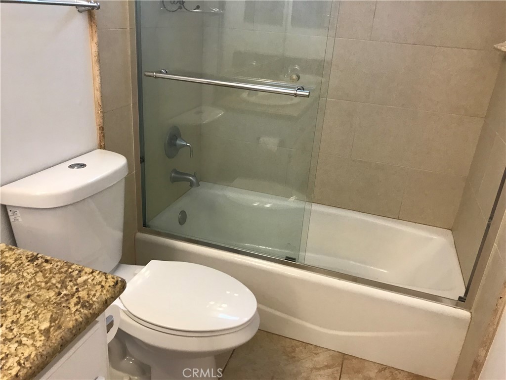 3 Morris Road Irvine, CA 92620 - Photo 19 of 24 a bathroom with a toilet and a shower