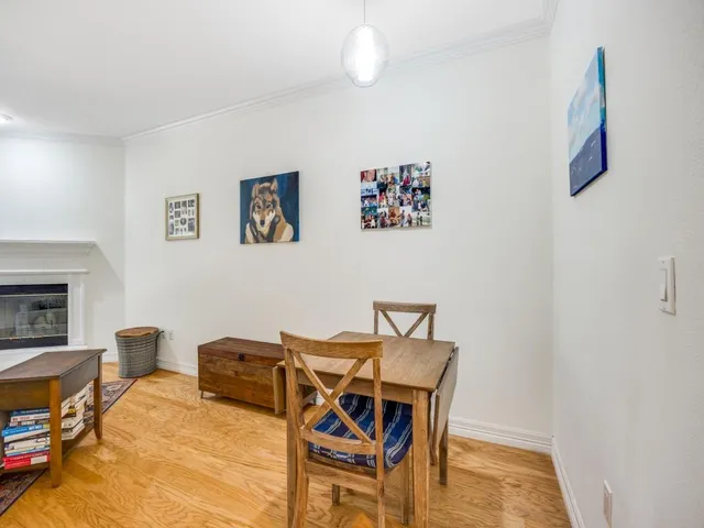 a workspace with furniture and a fireplace