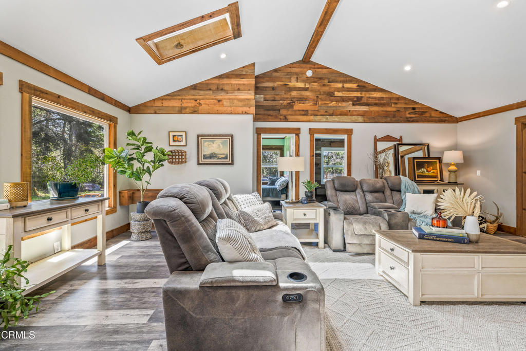 41912 Powers Road Mendocino, CA 95460 - Photo 11 of 48 a view of living room kitchen with furniture and large windows