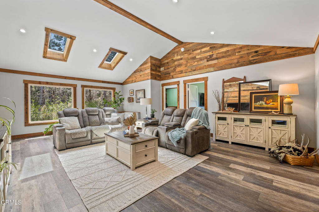 41912 Powers Road Mendocino, CA 95460 - Photo 13 of 48 a living room with furniture and a flat screen tv
