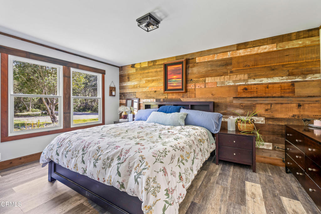 41912 Powers Road Mendocino, CA 95460 - Photo 17 of 48 a bed sitting in a bedroom next to a window