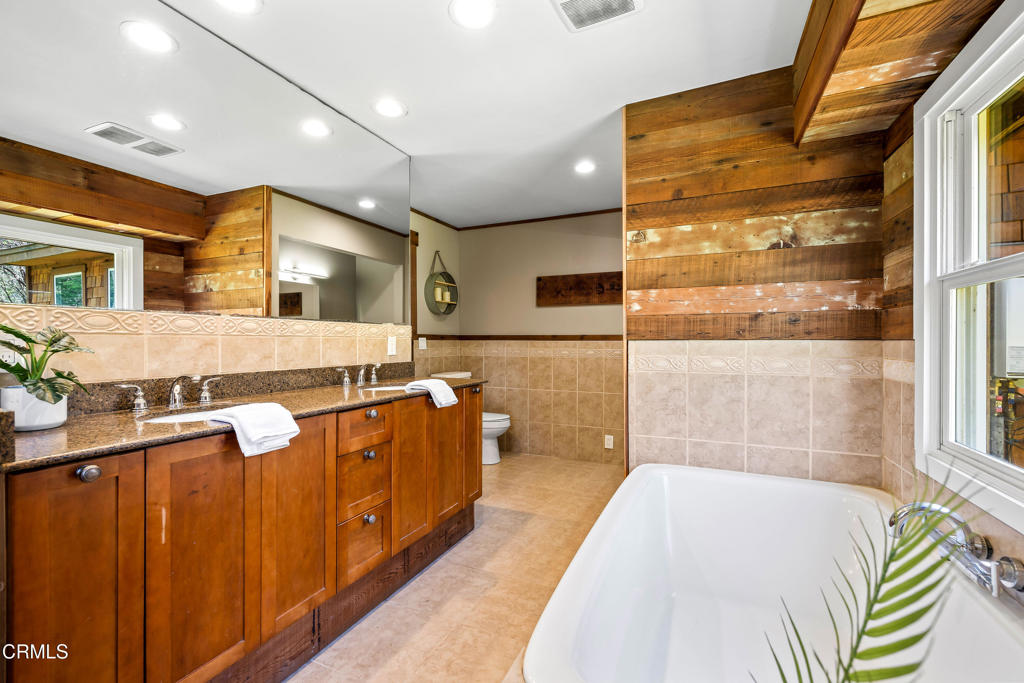 41912 Powers Road Mendocino, CA 95460 - Photo 19 of 48 a bathroom with a sink a bathtub and a shower