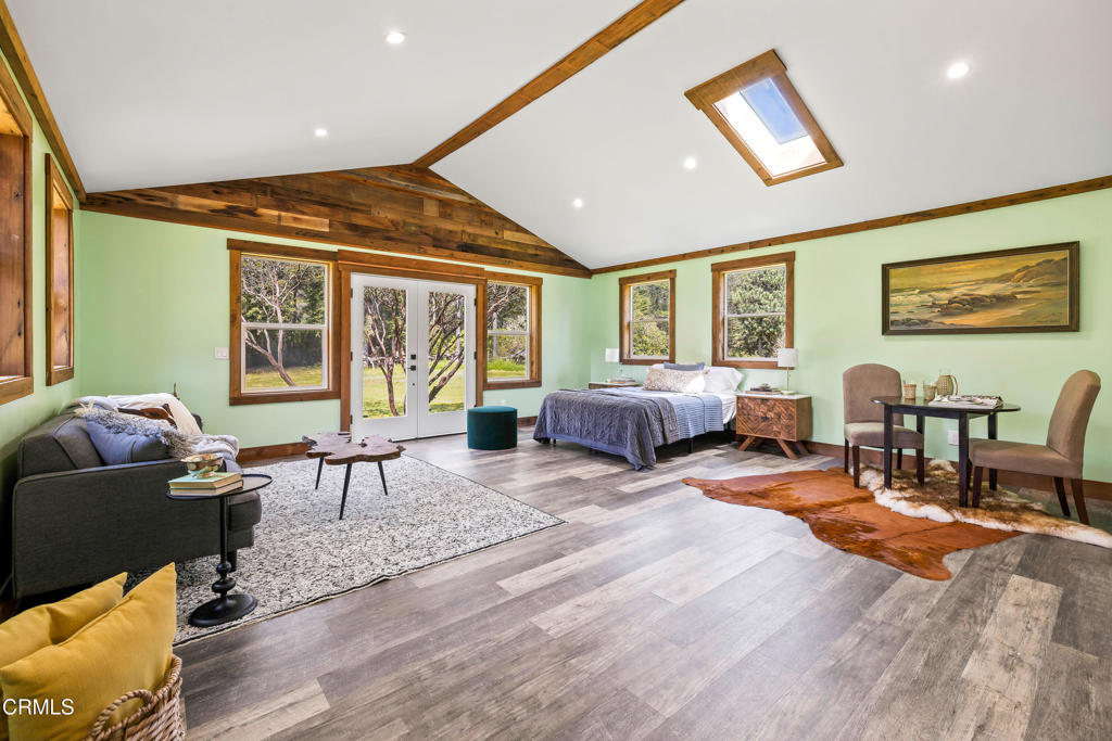 41912 Powers Road Mendocino, CA 95460 - Photo 24 of 48 a living room with furniture window and wooden floor