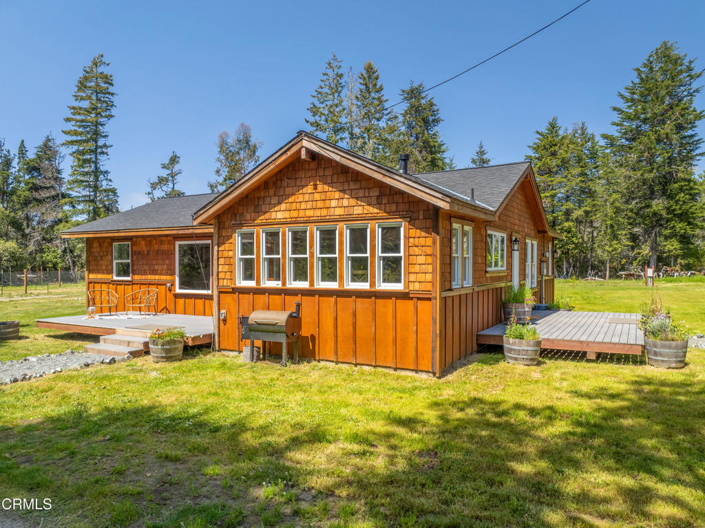 41912 Powers Road Mendocino, CA 95460 - Photo 37 of 48 a front view of a house with swimming pool having outdoor seating