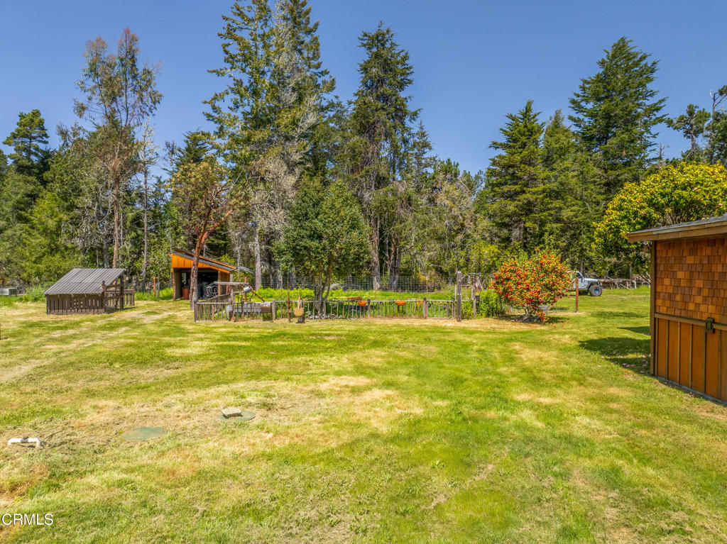 41912 Powers Road Mendocino, CA 95460 - Photo 43 of 48 a view of a swimming pool with an outdoor space and seating area