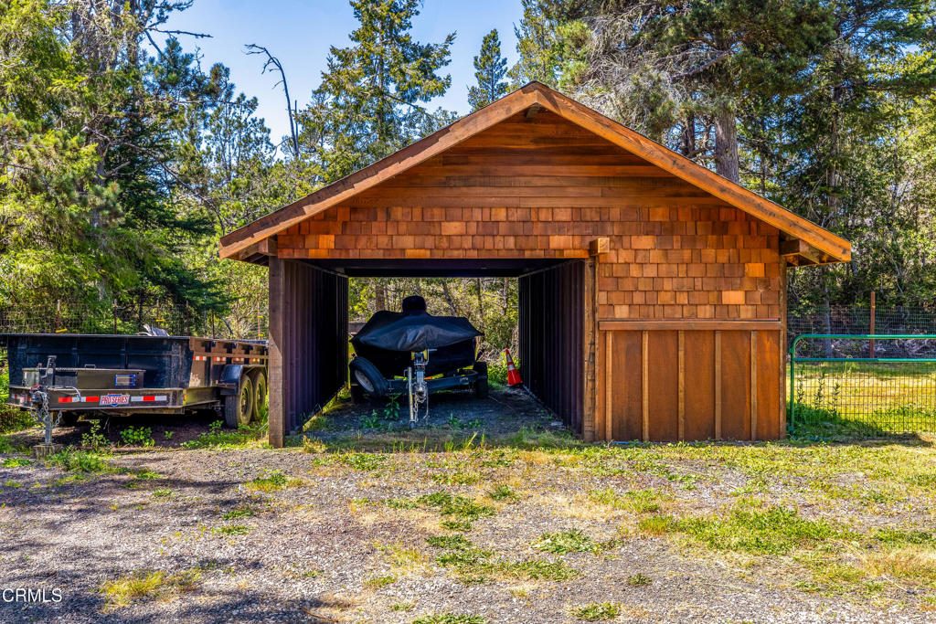 41912 Powers Road Mendocino, CA 95460 - Photo 44 of 48 a front view of a house with garden