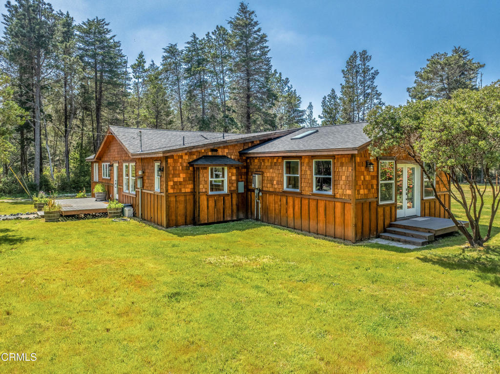 41912 Powers Road Mendocino, CA 95460 - Photo 6 of 48 a view of a house with swimming pool and porch