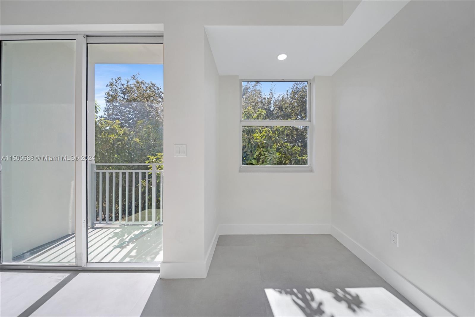 Civic Center Miami, FL 33125 - Photo 13 of 19 a view of a big room with wooden floor and windows